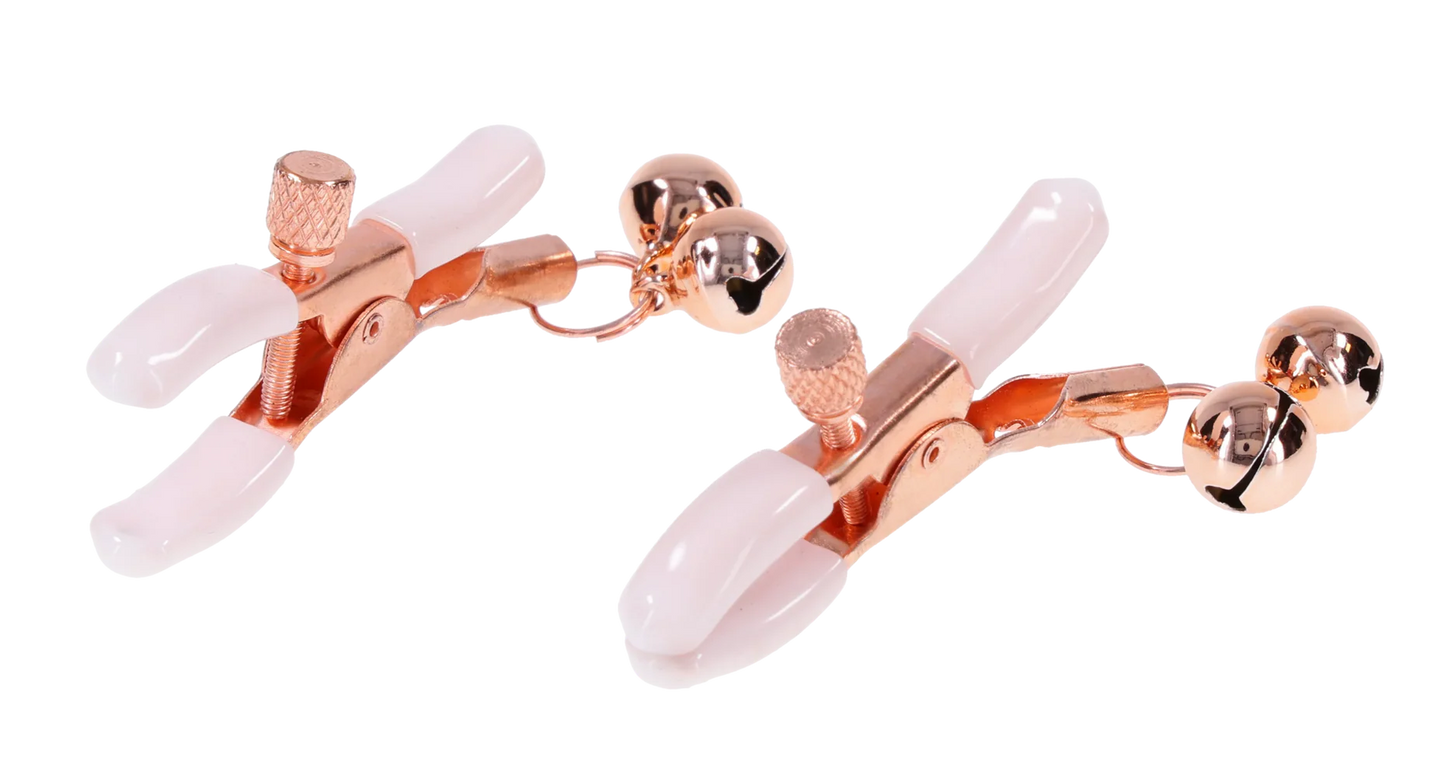 Pair of rose gold and pinkPeaches 'n CreaMe Bell Nipple Clamps on a white background