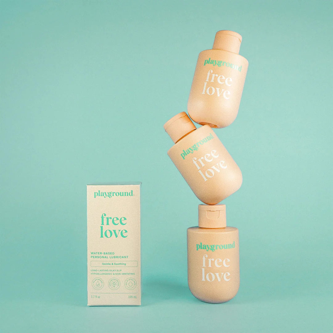 Playground Free Love Water Based Lubricant stack of bottles