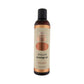 Bottle of sliquid massage oil with a beige label on a white background