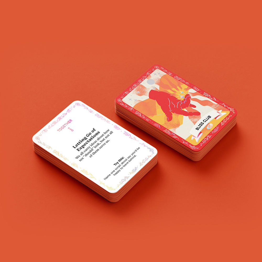 Two stacks of playing cards on an orange background