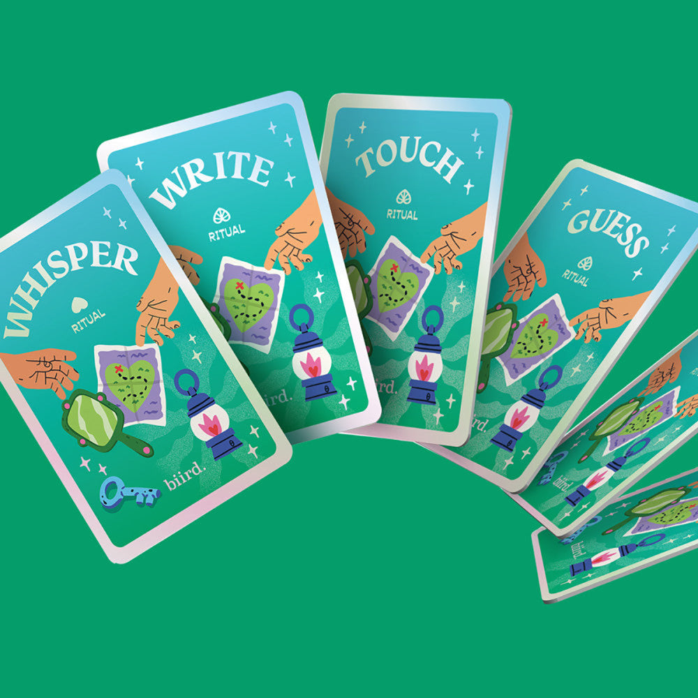 Set of cards with text 'Whisper', 'Write', 'Touch', and 'Guess' on a green background