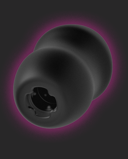 Black Blush URSELF Fortify FTM Stroker with a central hole on a dark background