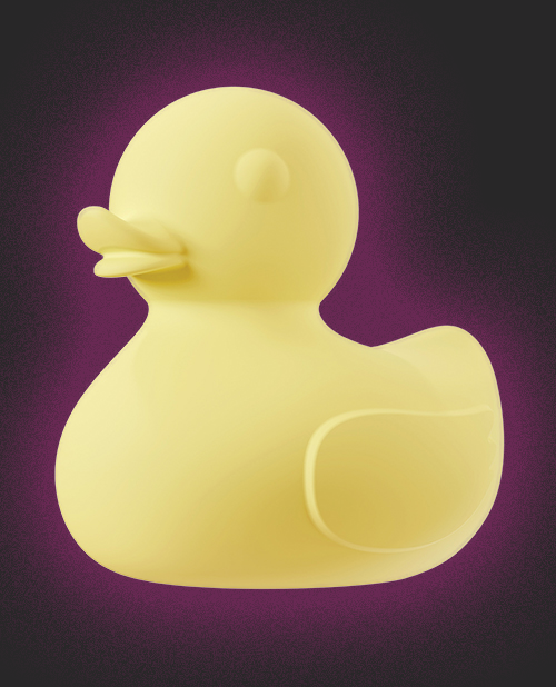 Yellow rubber duck sex toy vibrator on a purple background