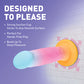 Product packaging with a colorful design on a tiled bathroom wall background.