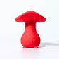 Red mushroom-shaped vibrator on a white background