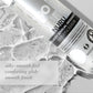 Nuru massage lubricant bottle with text on a marble background