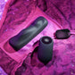 Black electronic Gender X Our Undie Vibe on pink lace fabric