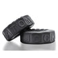 Two black Oxballs Sprocket No-Roll Cock Ring  with 'ATOM' and 'JOCK' embossed on a white background