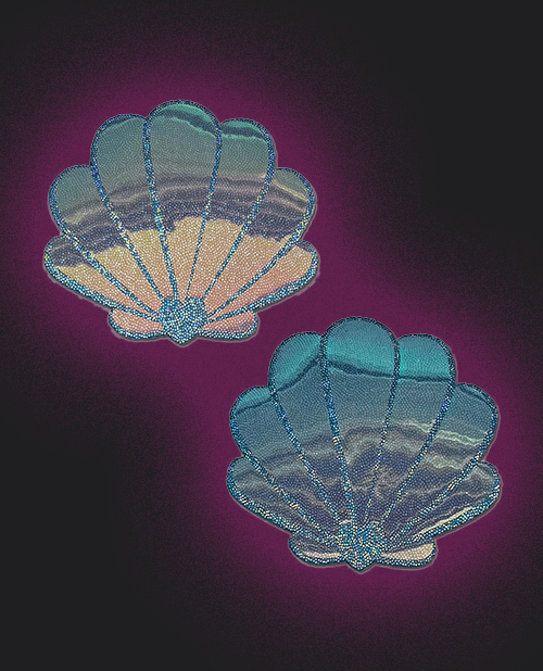 Two scallop shell designs on a dark purple background Pastease Opalescent Mermaid Shells