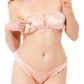 Woman wearing a pink lingerie set on a white background