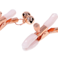 Pair of rose gold and pinkPeaches 'n CreaMe Bell Nipple Clamps  on a white background