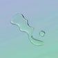 Playground Free Love Water Based Lubricant clear lube on glass