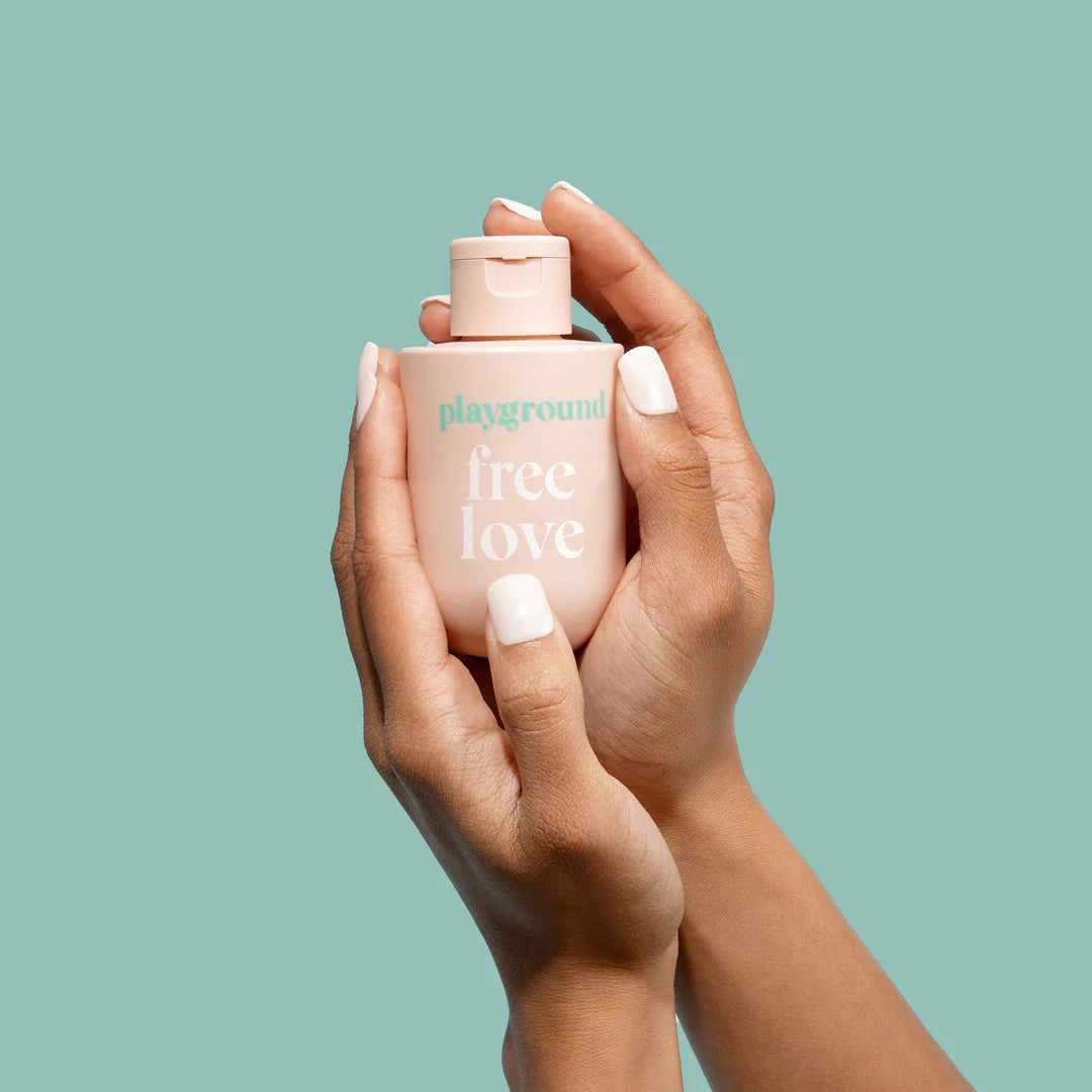 Playground Free Love Water Based Lubricant in hands