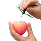 Romp Pink Peach Vibrator with a green and black cable being plugged into it, held by hands against a white background.