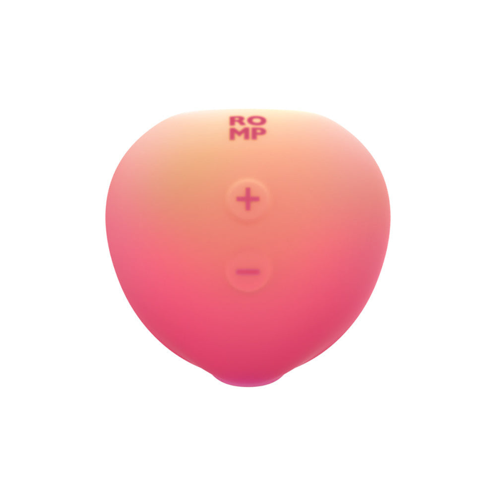 Romp Pink Peach Vibrator with 'ROMP' branding on a white background