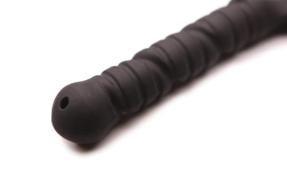 Black silicone Tantus Tawse Paddle on a white background