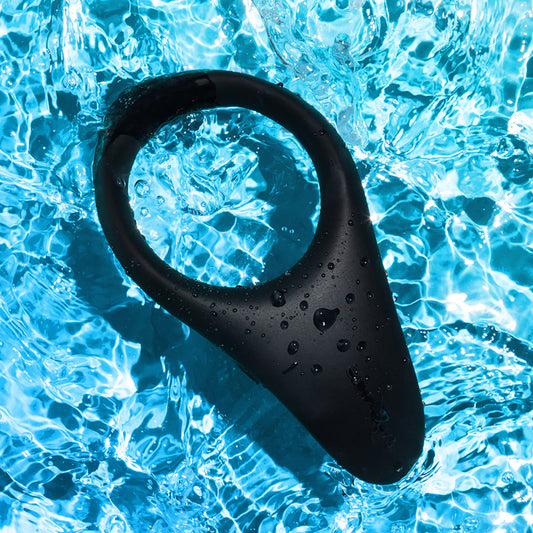 We-Vibe Verge 2 Cockring floating in clear blue water.