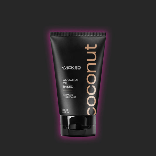 Wicked Coconut oil-based lubricant tube on a black background