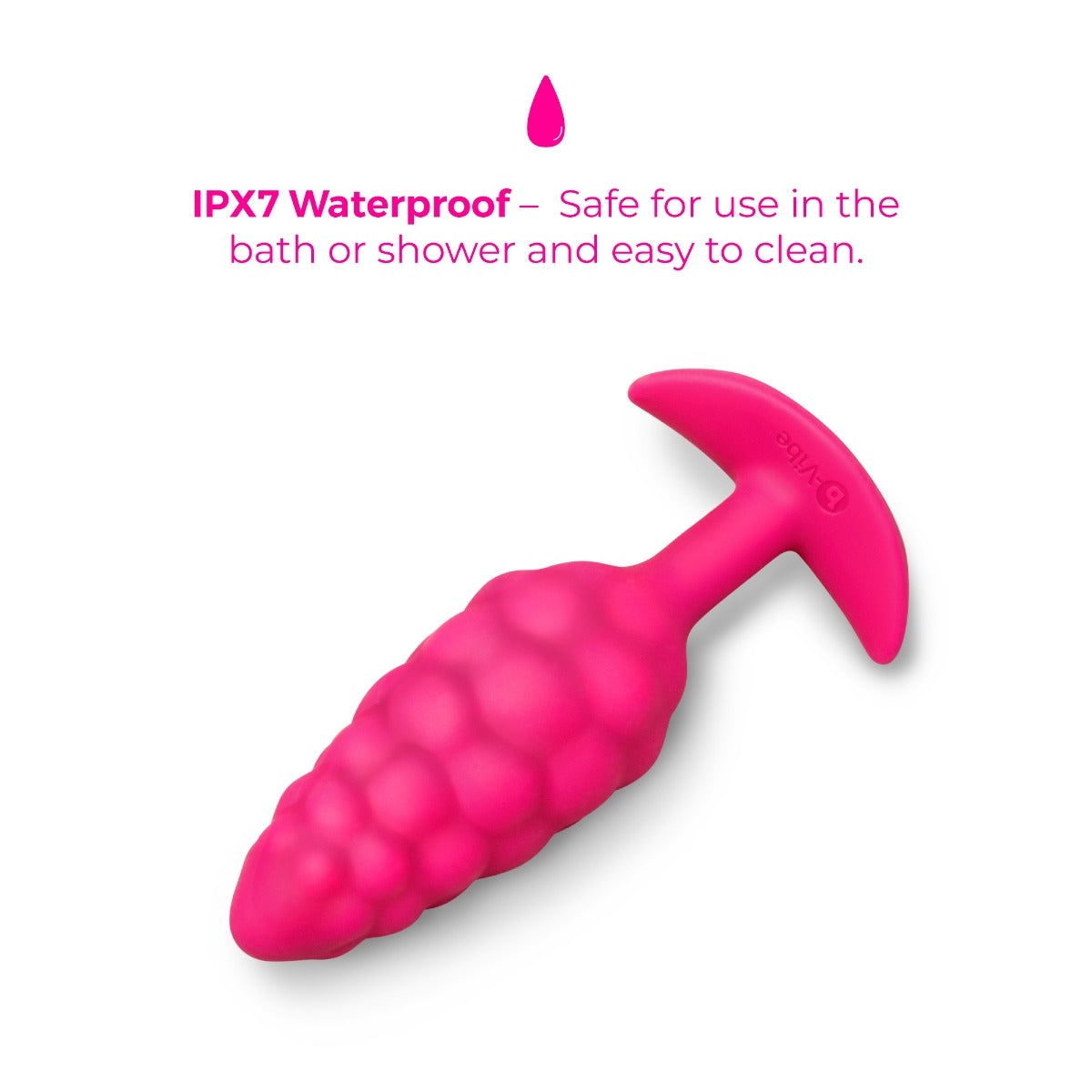 Pink waterproof b-Vibe Bump Texture Plug Small with IPX7 information on a white background