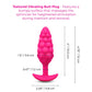 Pink textured vibrating butt plug with measurements on a white background