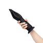 Hand wearing a black silicone glove on a white background