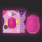 Pink ROMP Rose vibrator with packaging on a dark background