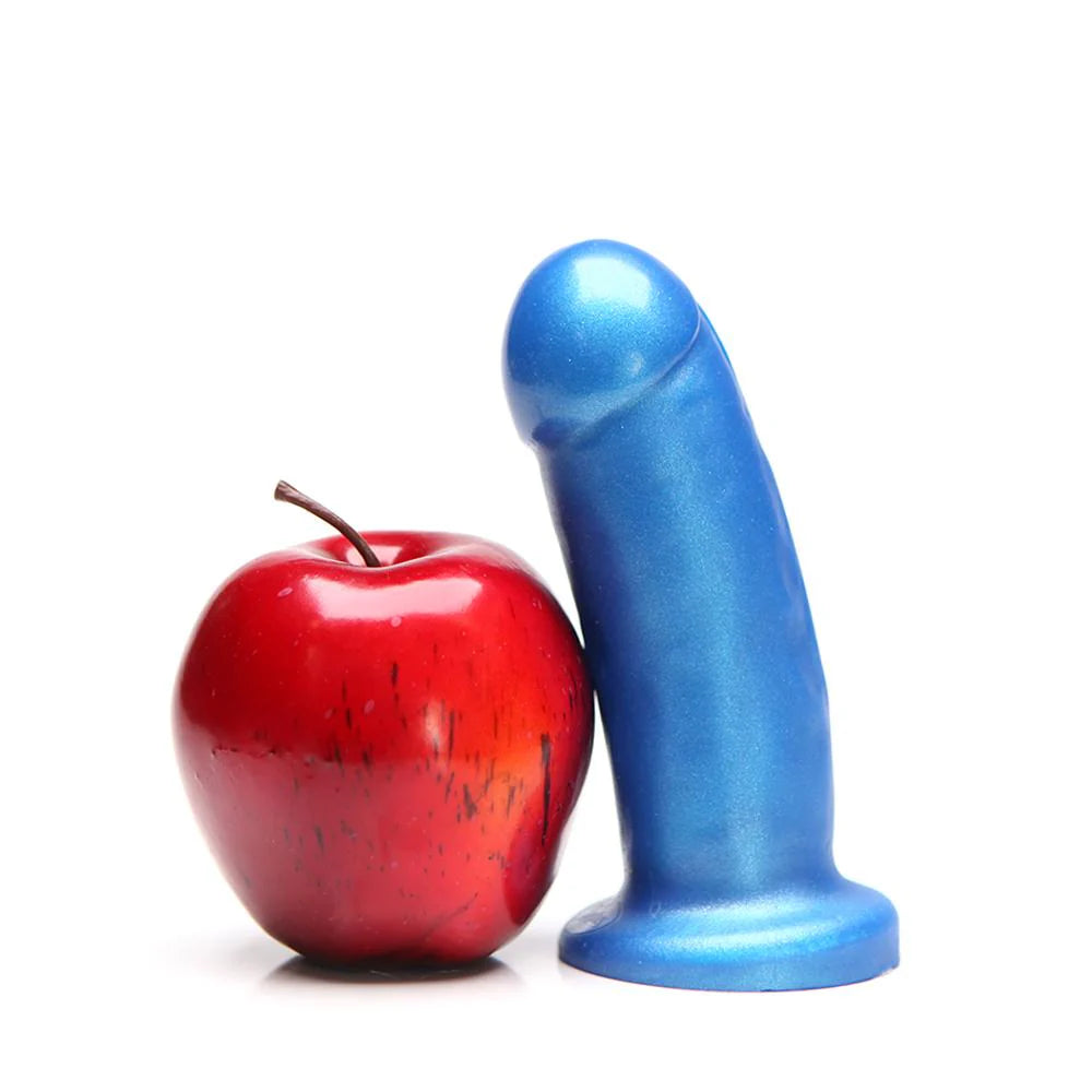 tantus they/them dildo next to apple